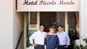 The entrance of Hotel Piccolo Mondo with a clear view of the facade and a glass door. - Hotel Piccolo Mondo (San Vito Lo Capo)