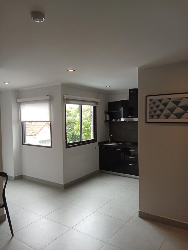 Apartment, Balcony, Park View | Private kitchen | Fridge, microwave, stovetop, cookware/dishes/utensils