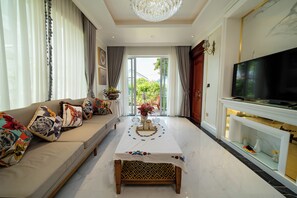 Villa, 4 Bedrooms, Beachfront | Living area