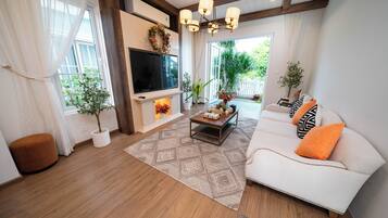 Vila panorâmica, 3 quartos, banheiro privativo, de frente para o oceano | Área de estar