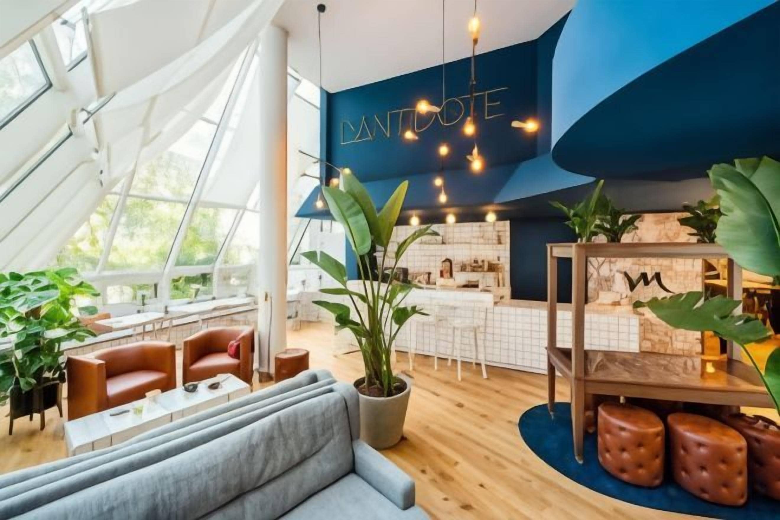 A modern interior with a bar area, seating, and a large window.