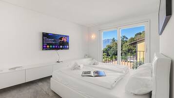 2 kamar tidur, setrika/meja setrika, Wi-Fi gratis, dan seprai linen