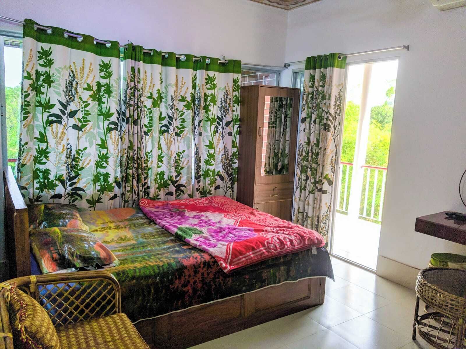 Economy Double Room, Balcony, Garden View | Free WiFi