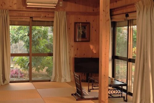 64 years traditianal okinawa house YuSuiJu in village