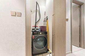 Laundry room - SML Vacation Homes Dubai - Sky High Apartments (Dubai)