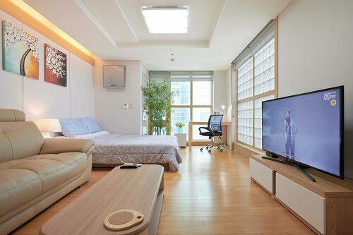 STUNNING 1-bedroom CORNER condo with Lots of Sunlight and your "Premier" Host!