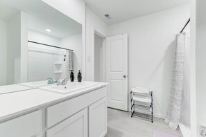Hair dryer, towels, soap, shampoo