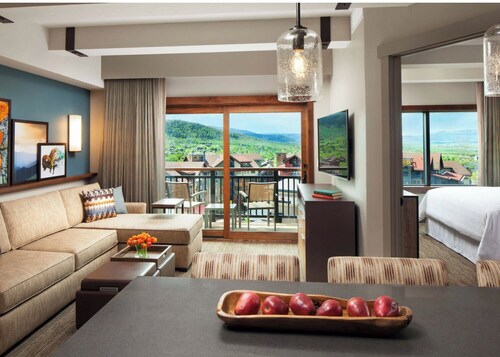 Ski-in/ski-out family resort steps from lifts in Steamboat, CO—year-round fun.
