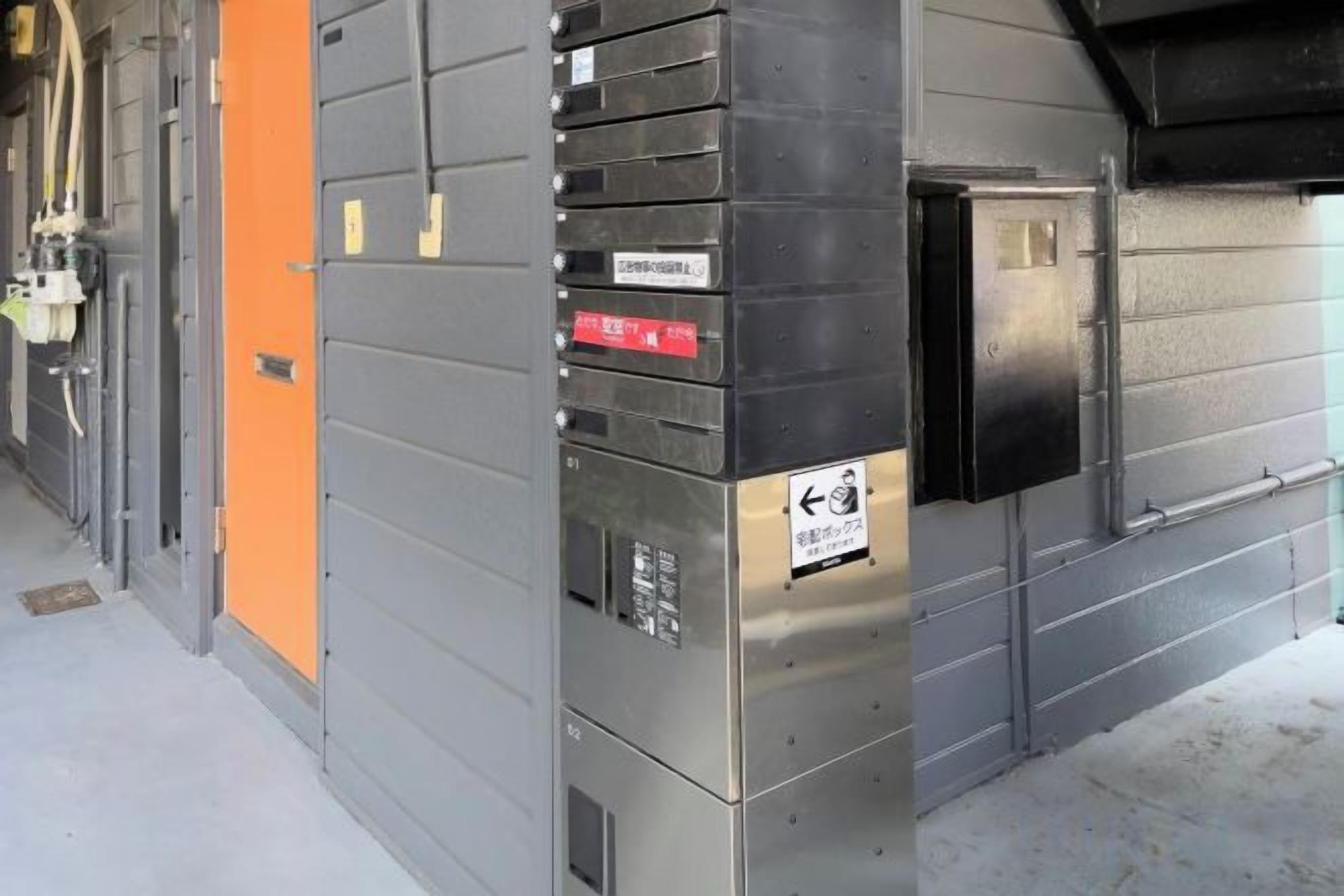 A set of metal lockers with a sign indicating a smoking area.