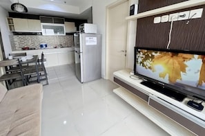 Living area - MODERn Trivium Apt 1BR w/ Wi-Fi, Pool & Gym (South Cikarang)