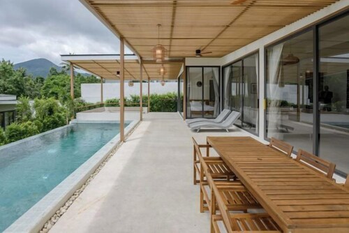 Tropical Peaceful Poolside Retreat by Sea N' Rent