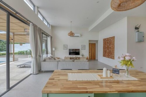 Tropical Peaceful Poolside Retreat by Sea N' Rent