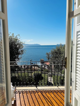 Property grounds. Charming Naples escape w/stunning sea views from private terrace