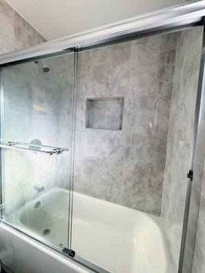 Shower, hair dryer, towels, soap