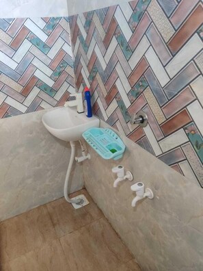 Shower, designer toiletries, towels, soap