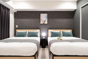 A hotel room with two beds, a nightstand with a lamp, a painting on the wall, and a window with curtains. - CREAL premier Akasaka (Minato-ku)