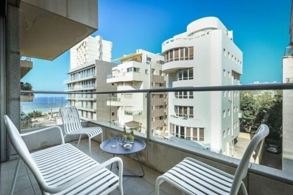 Iron/ironing board - Chic 3BR Apt with Balcony, Mamad (Tel Aviv)
