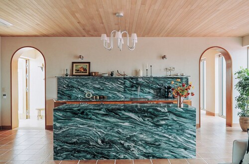 A private seaside villa in Jeju , with a tennis court just for you.