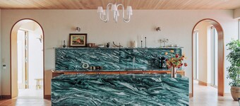 A private seaside villa in Jeju , with a tennis court just for you.