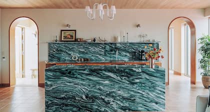 A private seaside villa in Jeju , with a tennis court just for you.