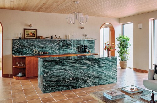 A private seaside villa in Jeju , with a tennis court just for you.