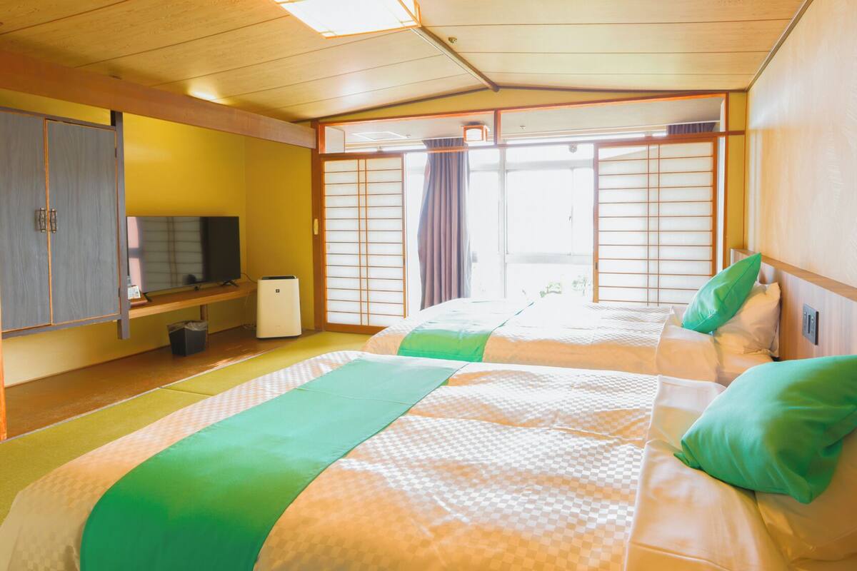 Habitación empresarial | Wifi gratis y ropa de cama 