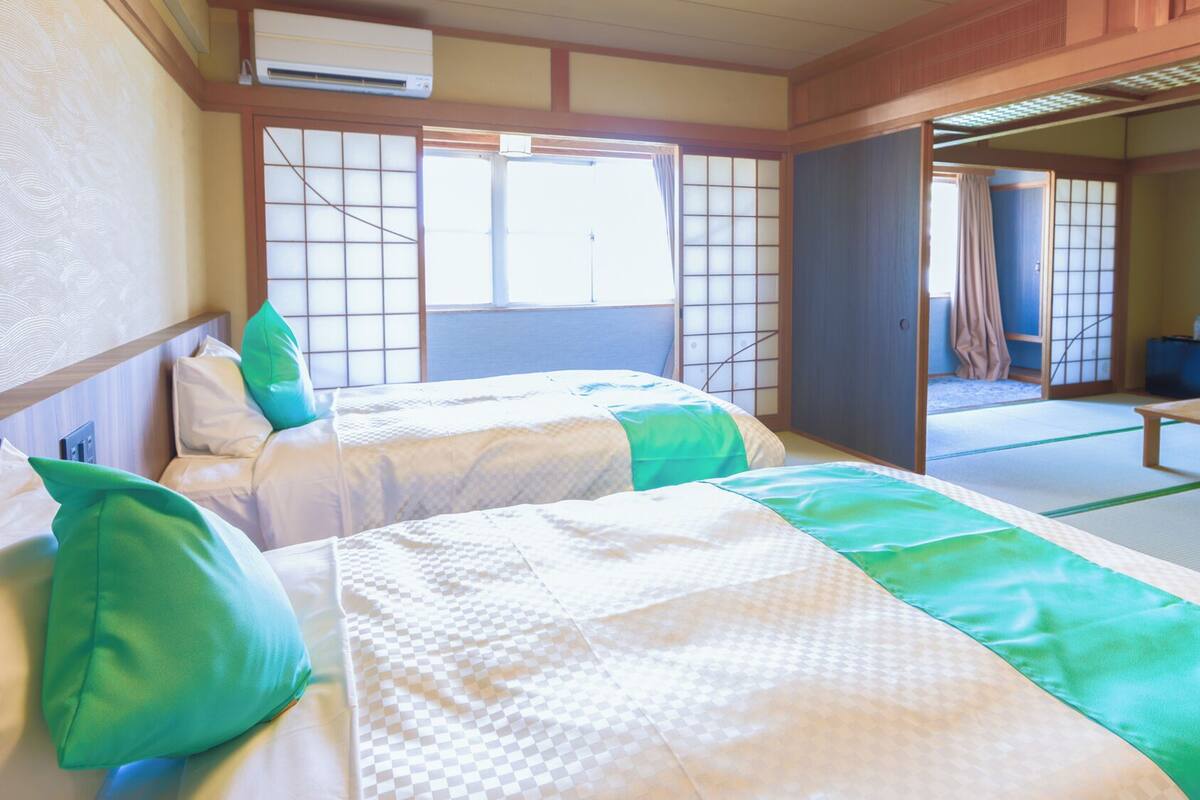 Habitación empresarial | Wifi gratis y ropa de cama 