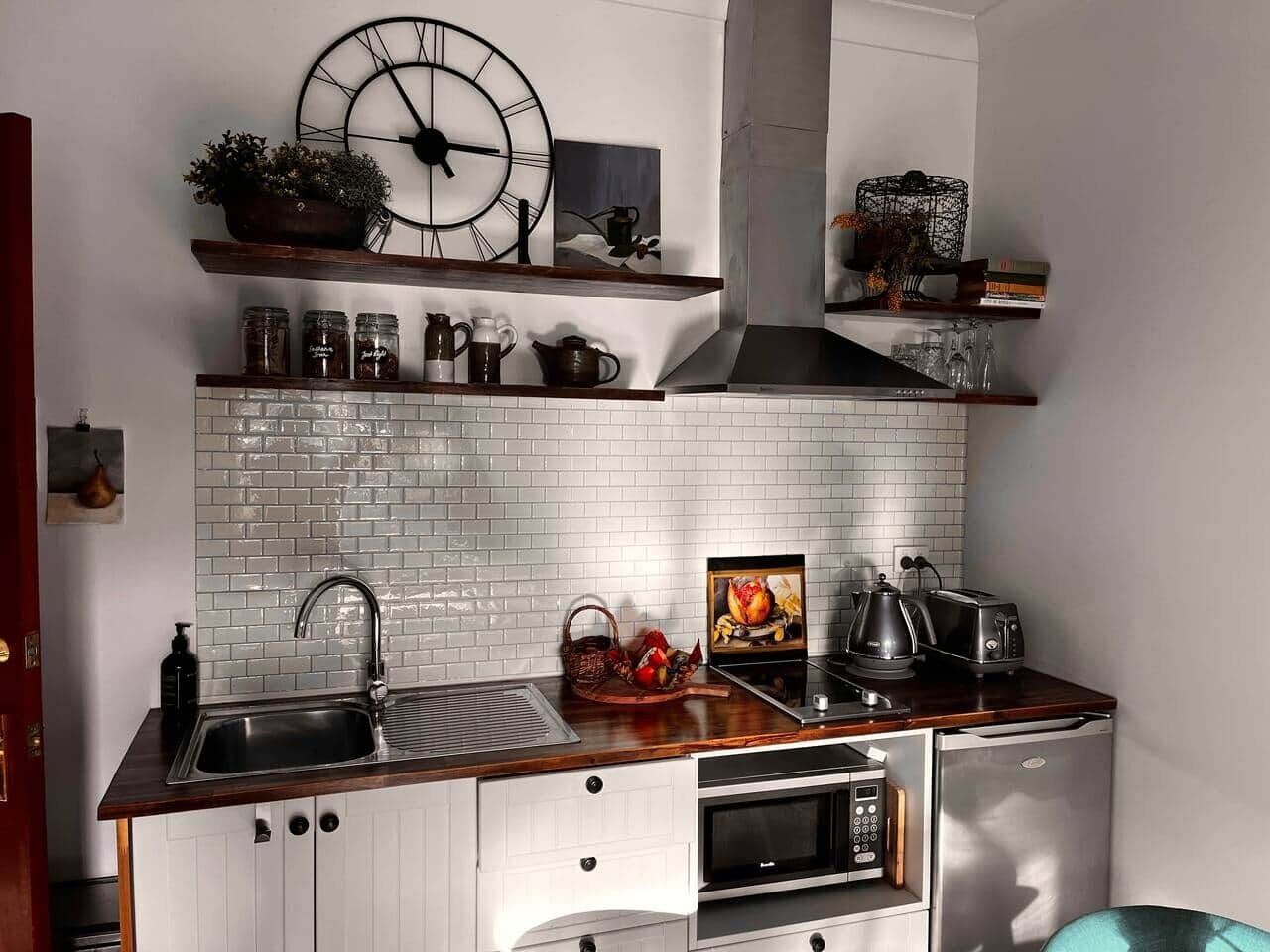 Fridge, microwave, stovetop, cookware/dishes/utensils