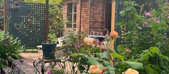 Peaceful garden setting + Private deck
