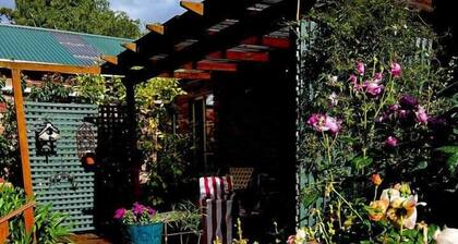 Peaceful garden setting + Private deck