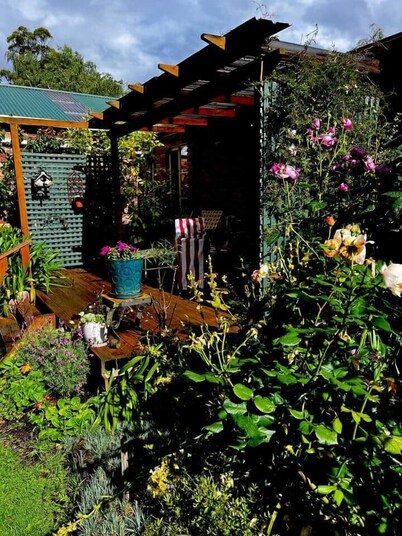 Peaceful garden setting + Private deck
