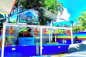 Outdoor pool - Dmi Hotels and Apartments, Tabaco City Albay by RedDoorz (Tabaco)