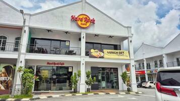 A Hard Rock Cafe with a prominent sign, a second-story balcony, and a 'Lunch Set' banner.