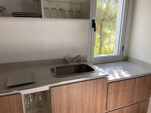 Fridge, microwave, coffee/tea maker, toaster