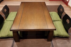 A wooden dining table with matching chairs. - [Mina's SamuraiHouse] 1 house (4 bedrooms/9 beds/1 parking lot) (Takayama)