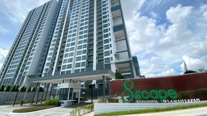 A high-rise building with a modern design, featuring a prominent entrance and a sign that reads "8scape". - Perling 8scape 3BR Comfy Zone nr Bukitindah/Sutera (Johor Bahru)