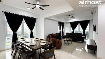 Deluxe Condo, 4 Bedrooms, Balcony, City View | Living area