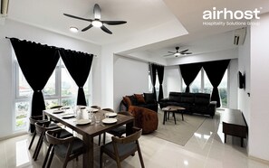Deluxe Condo, 4 Bedrooms, Balcony, City View | Living area