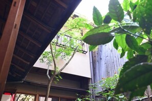 Exterior detail - Dozen Ryokan. over 100 years old.Cafe on the ground floor.550m from JR Kyoto station. (Kyoto)