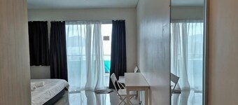 Peaceful 1-Bedroom Unit at Marina Island by JoMy Homestay