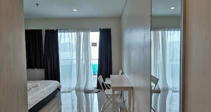 Peaceful 1-Bedroom Unit at Marina Island by JoMy Homestay