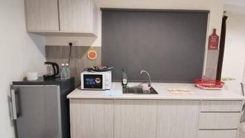 Tabla de planchar con plancha