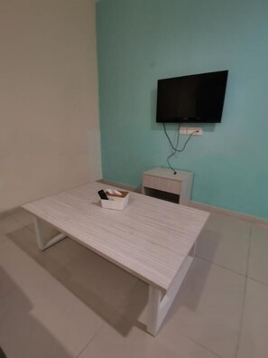 Tabla de planchar con plancha