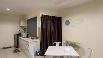 Tabla de planchar con plancha