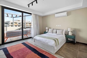 Signature Apartment, City View | Minibar, desk, laptop workspace, blackout drapes - Sodic Villette New Cairo by BirdNest (New Cairo)