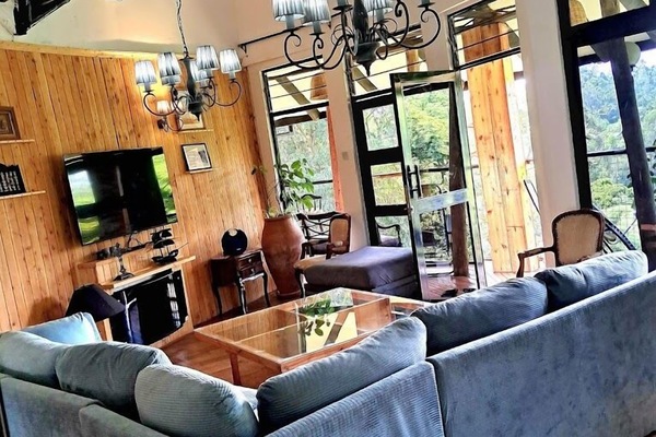 Family Cottage, Balcony, Garden View | Living area | 32-inch Smart TV with digital channels