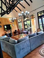 Family Cottage, Balcony, Garden View | Living area | 32-inch Smart TV with digital channels