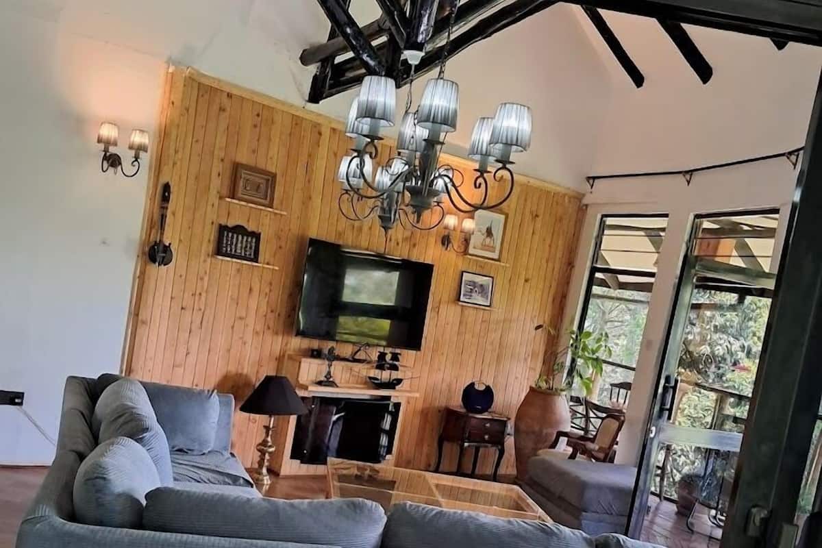 Family Cottage, Balcony, Garden View | Living area | 32-inch Smart TV with digital channels