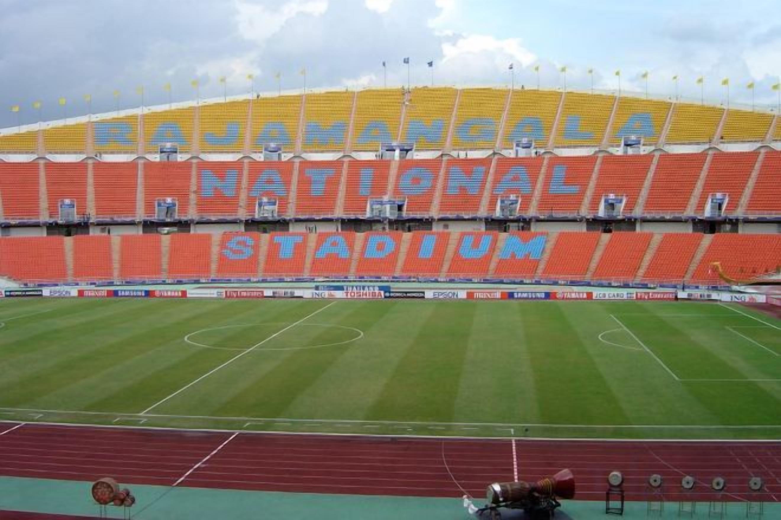 A stadium with 'NATIONAL STADIUM' written on the stands.
