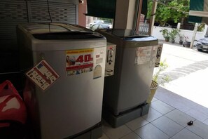 Two commercial refrigerators with price tags and a red plastic bag on the floor. - W. House for group, Cozy Loft near Suvarnabhumi Airport (Bangkok)